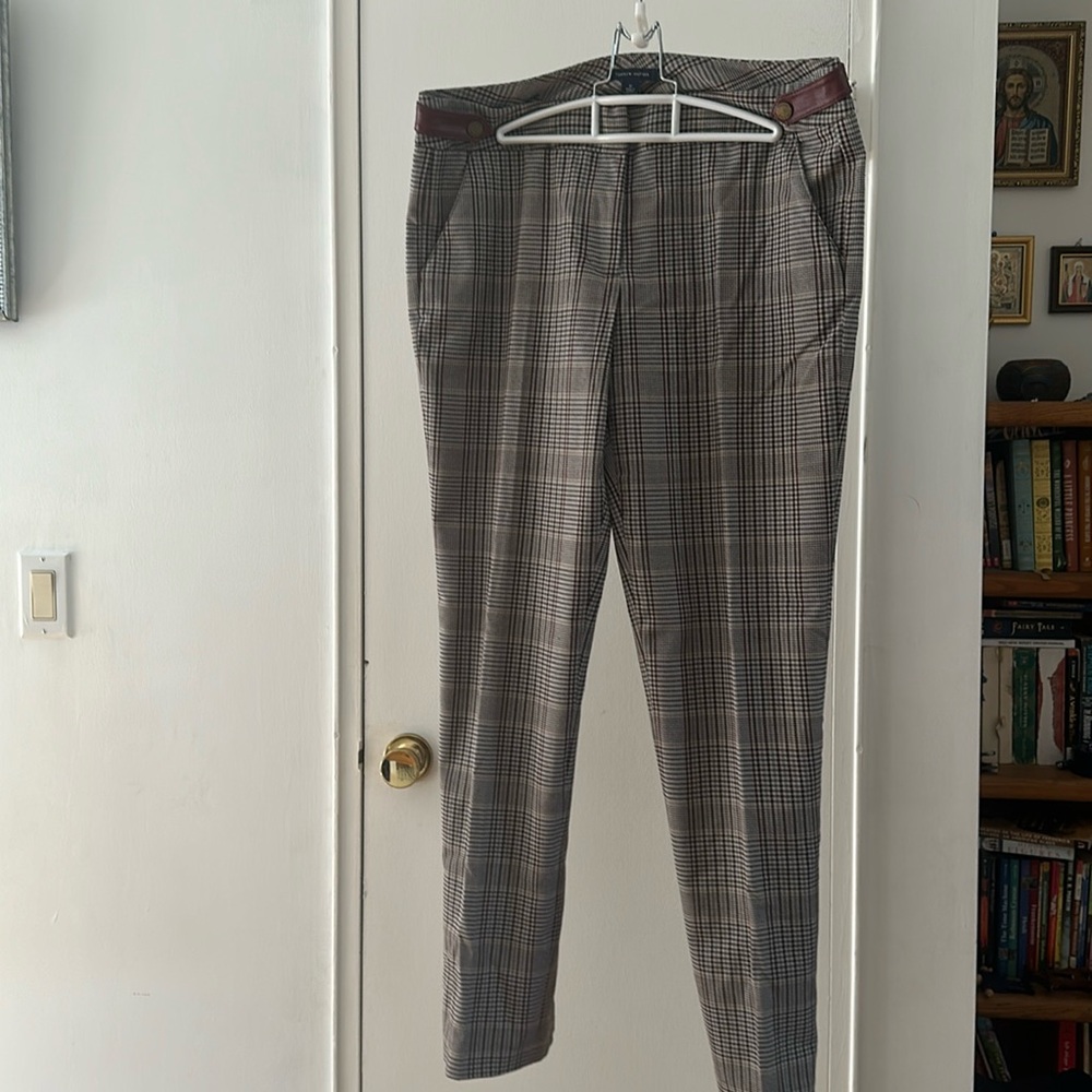 Tommy Hilfiger pants.Size 10. Like new.With stain on back,could be removed.